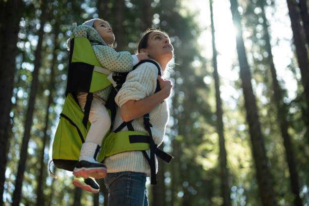 Take your baby on a trip using a baby carrier.
