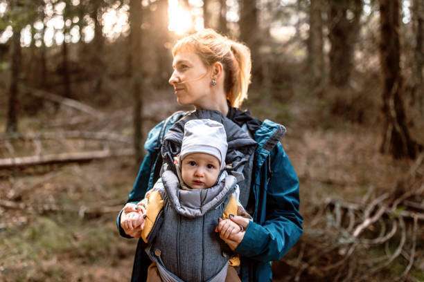 woman with her baby in a baby carrier